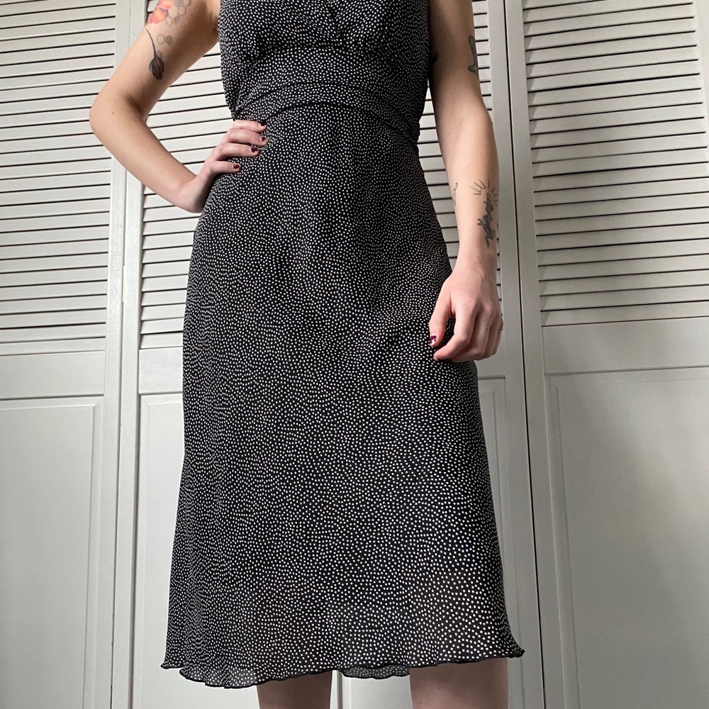Sheer black and white polka-dotted dress